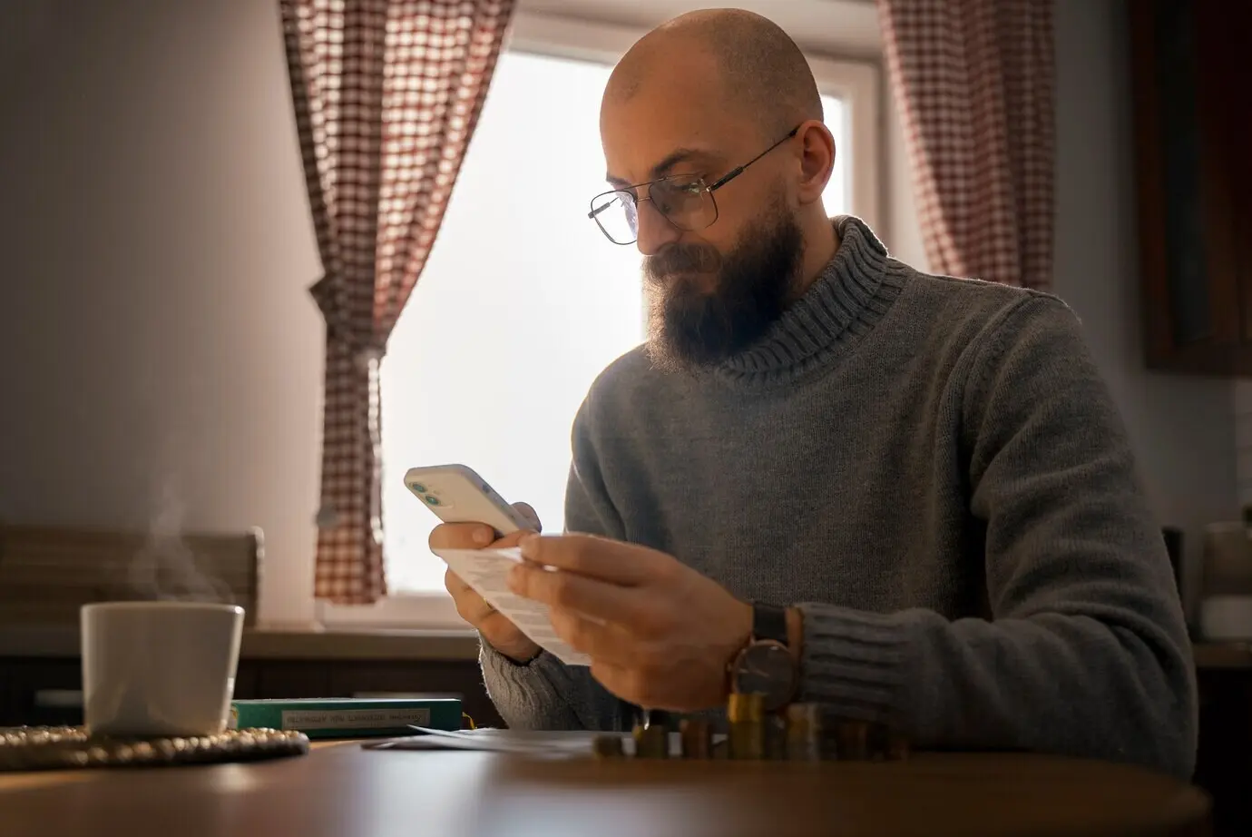 A man looking at a bill during an energy crisis.